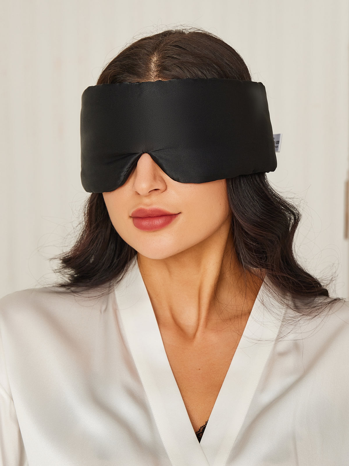 Elegante antifaz para dormir de seda de una pieza